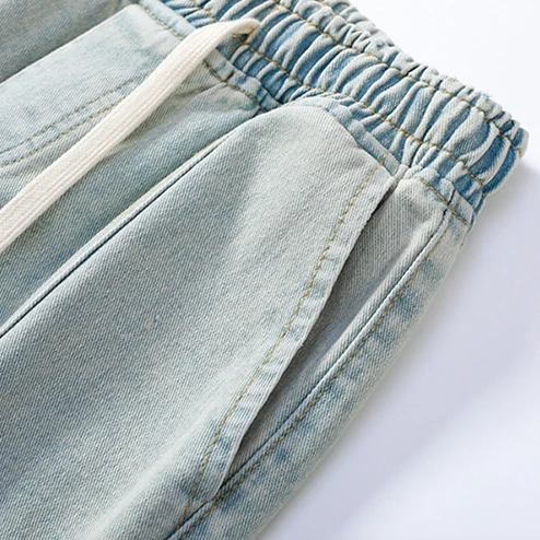 Nexus Distressed Denim Joggers - Image 13