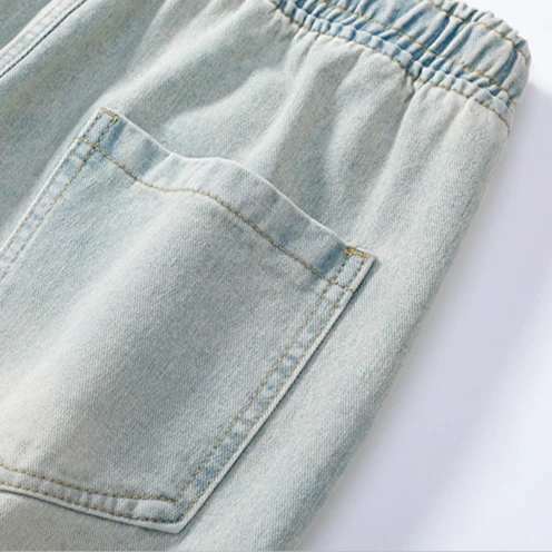 Nexus Distressed Denim Joggers - Image 15